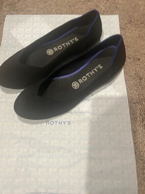 Rothy's Black Flats with Blue Trim